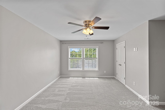 10906 Charmont Pl, Huntersville, NC 28078 - carpeted spare room featuring baseboards and a ceiling fan