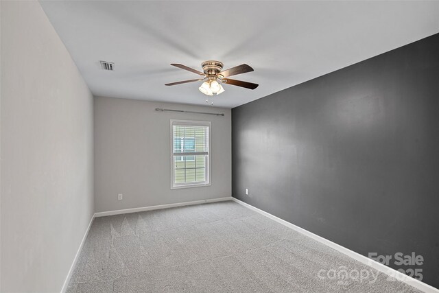 10906 Charmont Pl, Huntersville, NC 28078 - spare room with ceiling fan, carpet floors, and baseboards
