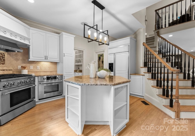 4429 Cameron Oaks Dr, Charlotte, NC 28211 - kitchen featuring light wood-style flooring, open shelves, high end appliances, and white cabinets