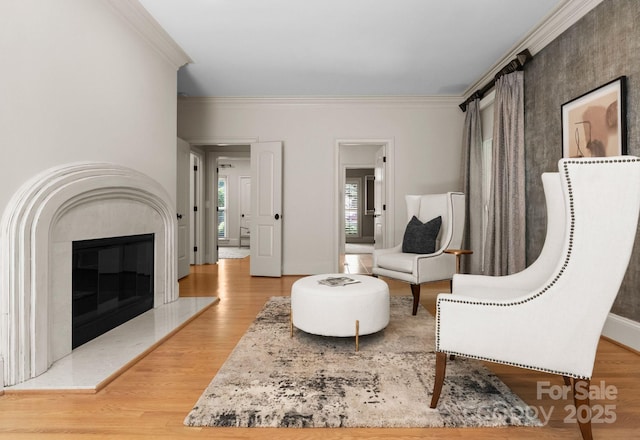 4429 Cameron Oaks Dr, Charlotte, NC 28211 - living area with crown molding, baseboards, wood finished floors, and a fireplace
