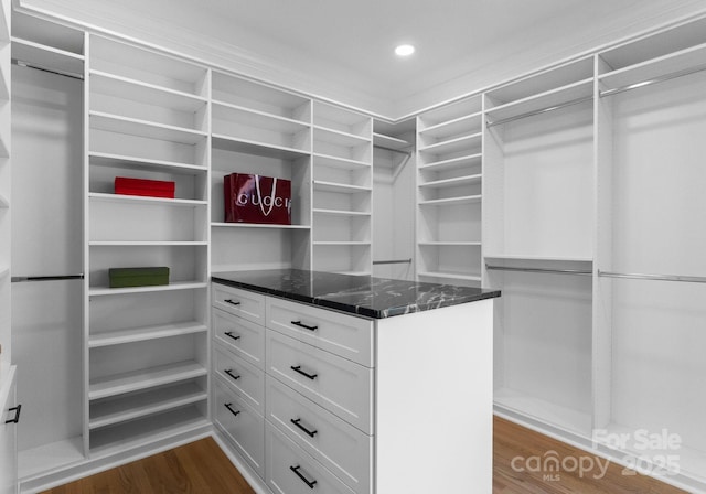 4429 Cameron Oaks Dr, Charlotte, NC 28211 - walk in closet with dark wood finished floors