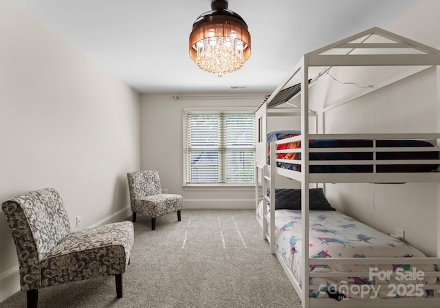 4429 Cameron Oaks Dr, Charlotte, NC 28211 - carpeted bedroom with a chandelier and baseboards