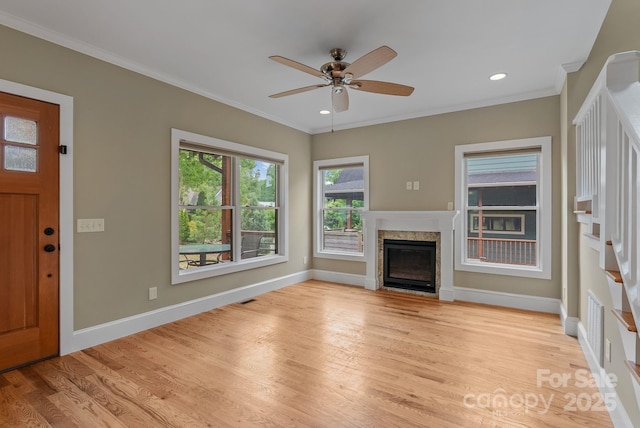 38 Unadilla Aly, Asheville, NC 28803 - unfurnished living room with ceiling fan, light wood-type flooring, a fireplace, baseboards, and ornamental molding