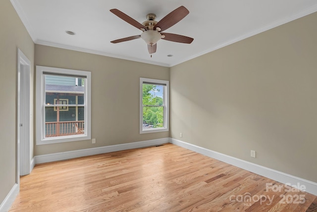 38 Unadilla Aly, Asheville, NC 28803 - unfurnished room featuring baseboards, light wood-style flooring, crown molding, and ceiling fan
