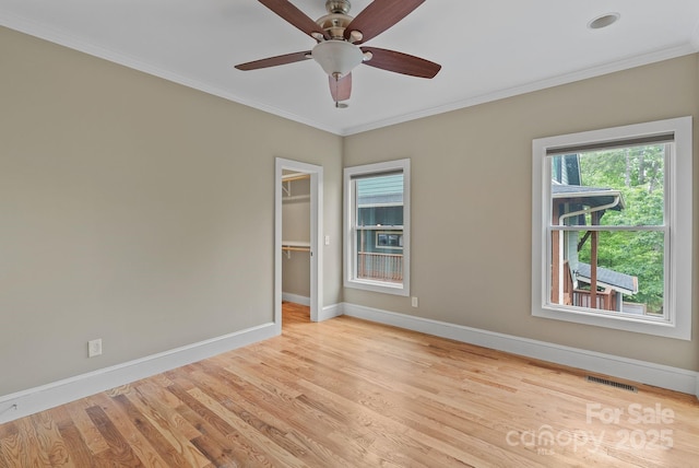 38 Unadilla Aly, Asheville, NC 28803 - empty room featuring ornamental molding, baseboards, light wood finished floors, and ceiling fan