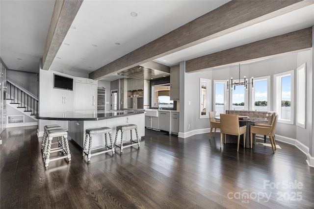 3386 Governors Island Dr, Denver, NC 28037 - dining space with baseboards, beam ceiling, a chandelier, dark wood-style floors, and stairway