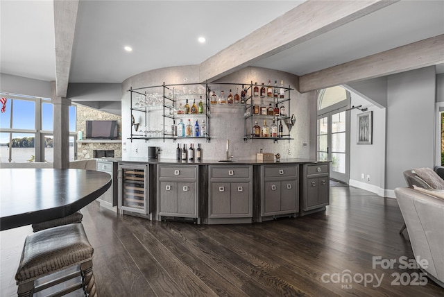 3386 Governors Island Dr, Denver, NC 28037 - indoor wet bar with wine cooler, beam ceiling, dark wood-type flooring, backsplash, and recessed lighting