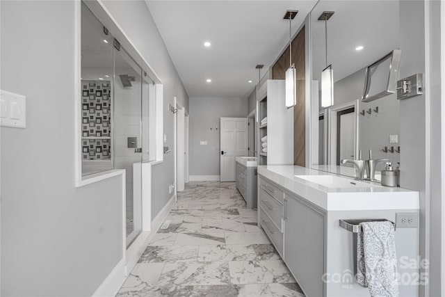 3386 Governors Island Dr, Denver, NC 28037 - full bathroom featuring marble finish floors, a shower stall, recessed lighting, baseboards, and two vanities