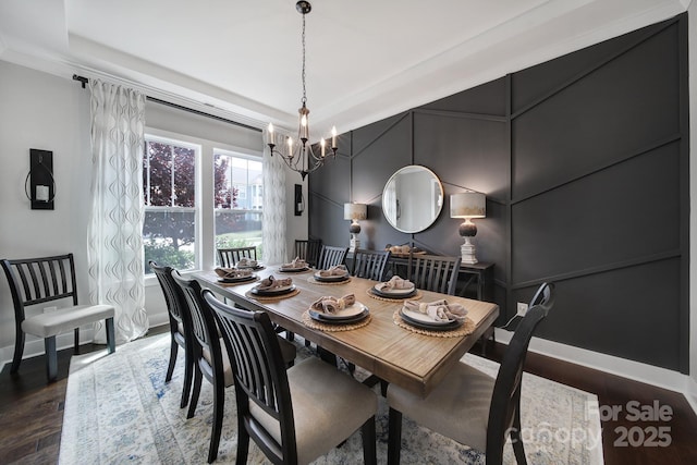 2025 Masons Bend Dr, Fort Mill, SC 29708 - dining space featuring a chandelier, baseboards, wood finished floors, ornamental molding, and a tray ceiling