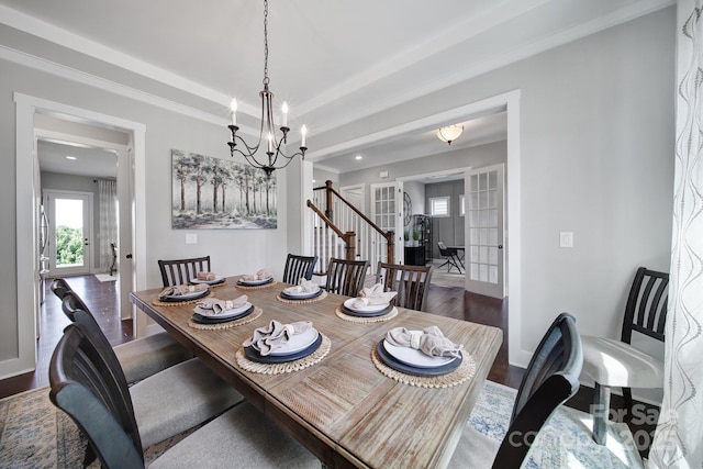 2025 Masons Bend Dr, Fort Mill, SC 29708 - dining area with wood finished floors, baseboards, a chandelier, and ornamental molding