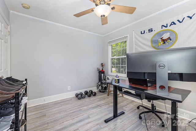 office area featuring a ceiling fan, wood finished floors, ornamental molding, and baseboards