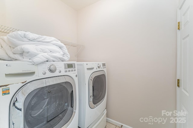 15037 Taylor Ridge Ln Unit 25, Charlotte, NC 28273 - clothes washing area featuring separate washer and dryer and baseboards