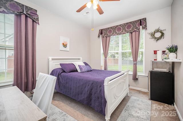 15037 Taylor Ridge Ln Unit 25, Charlotte, NC 28273 - bedroom with light carpet, baseboards, and ceiling fan