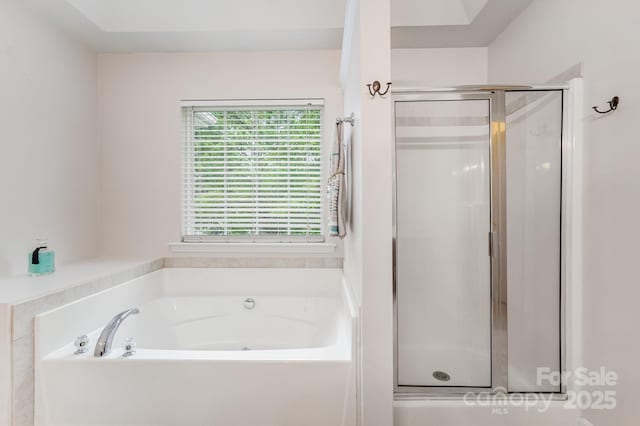 15037 Taylor Ridge Ln Unit 25, Charlotte, NC 28273 - full bathroom featuring a shower stall and a garden tub