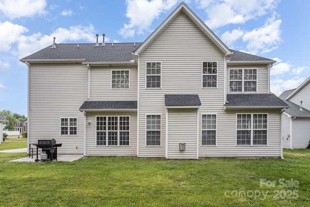 15037 Taylor Ridge Ln Unit 25, Charlotte, NC 28273 - back of house featuring a yard, a patio, and a shingled roof