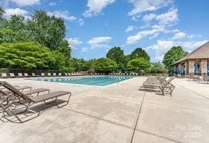 15037 Taylor Ridge Ln Unit 25, Charlotte, NC 28273 - community pool featuring a patio