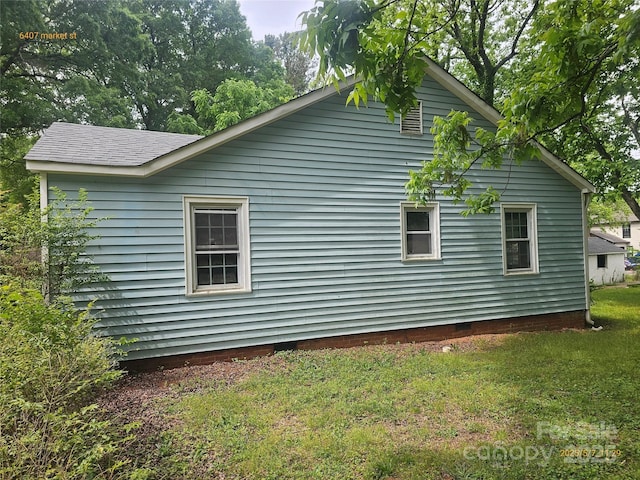 6407 Market St, Charlotte, NC 28215 - view of side of property featuring crawl space and a lawn