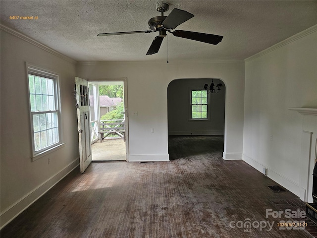 6407 Market St, Charlotte, NC 28215 - unfurnished room featuring arched walkways, ceiling fan, wood finished floors, a textured ceiling, and baseboards