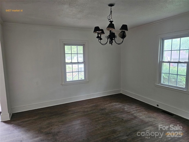 6407 Market St, Charlotte, NC 28215 - empty room with a chandelier, plenty of natural light, dark wood-type flooring, crown molding, and a textured ceiling