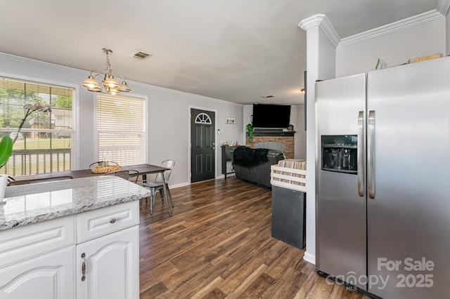 201 Easy St, Concord, NC 28027 - kitchen with stainless steel fridge, ornamental molding, a chandelier, white cabinets, and dark wood-style floors