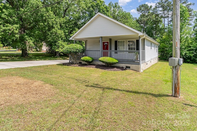 201 Easy St, Concord, NC 28027 - view of front facade featuring crawl space, a porch, a front yard, and concrete driveway