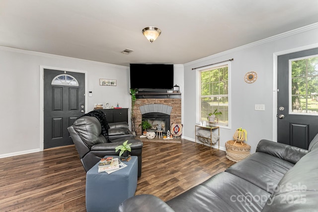 201 Easy St, Concord, NC 28027 - living area featuring wood finished floors, ornamental molding, baseboards, and a brick fireplace