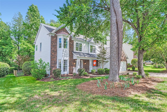 7600 Ridgefield Dr, Charlotte, NC 28269 - traditional-style home with brick siding and a front yard