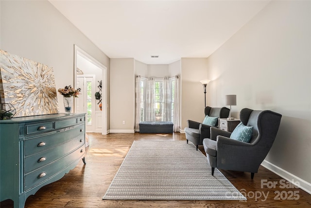 7600 Ridgefield Dr, Charlotte, NC 28269 - sitting room featuring wood finished floors, visible vents, and baseboards