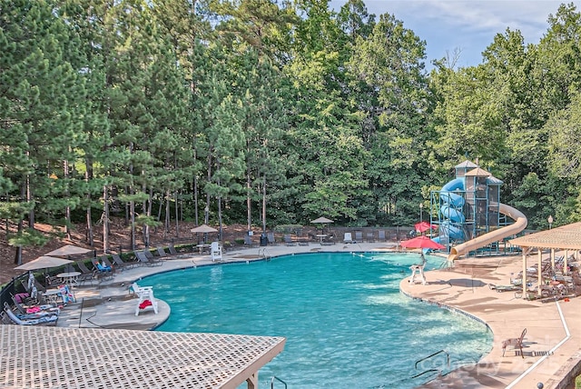 7600 Ridgefield Dr, Charlotte, NC 28269 - pool featuring a patio and a water slide