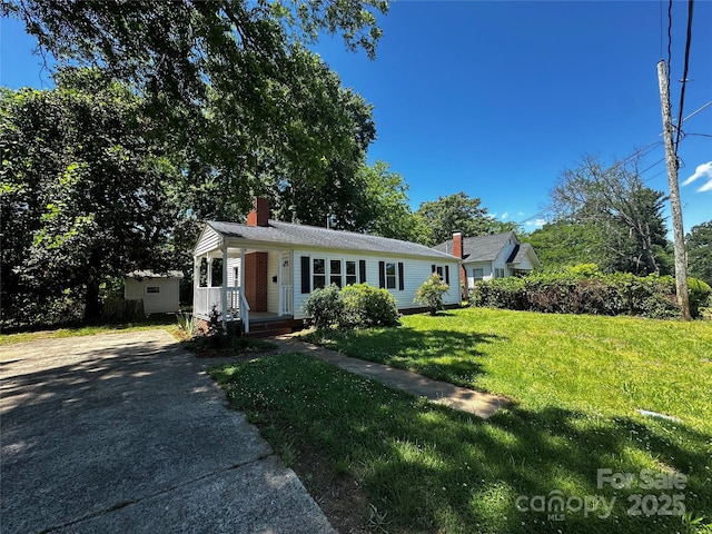 1119 Sanders St, Rock Hill, SC 29732 - bungalow with a chimney and a front lawn