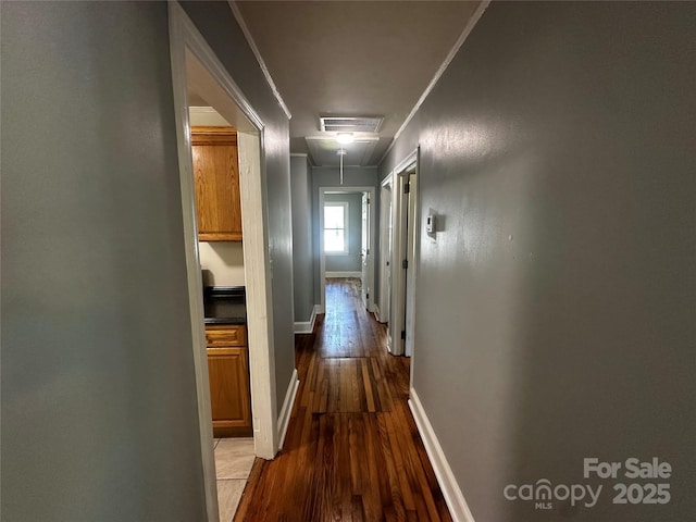 1119 Sanders St, Rock Hill, SC 29732 - hall featuring wood finished floors, attic access, crown molding, visible vents, and baseboards