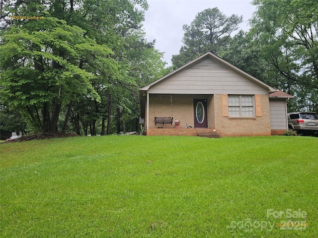 1700 Old Towne Ct, Charlotte, NC 28217 - view of front facade featuring a front lawn and brick siding
