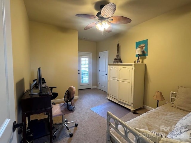 bedroom featuring carpet floors, baseboards, and ceiling fan
