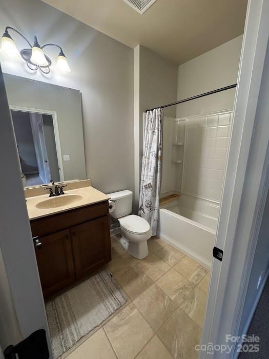 bathroom with vanity, toilet, and shower / tub combo with curtain