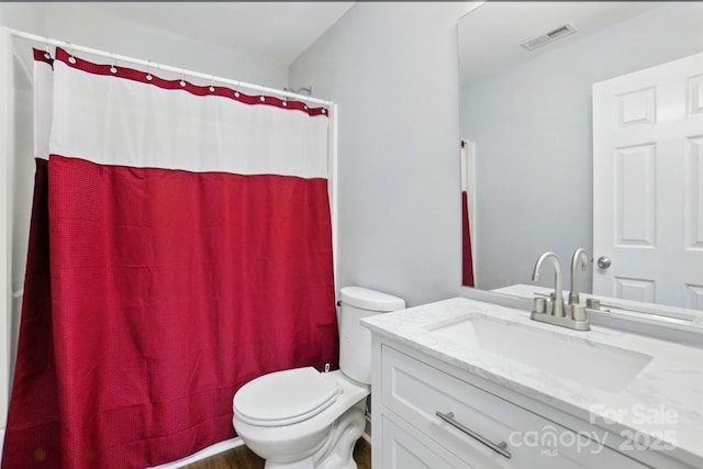 10431 Plantain Ct, Charlotte, NC 28213 - full bathroom featuring toilet, vanity, and a shower with curtain