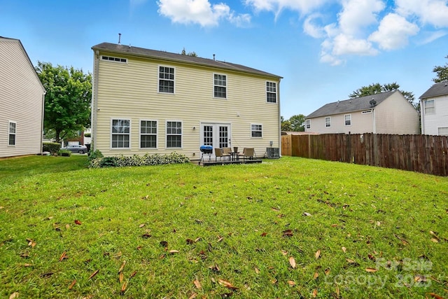10431 Plantain Ct, Charlotte, NC 28213 - back of house with a patio and central AC unit