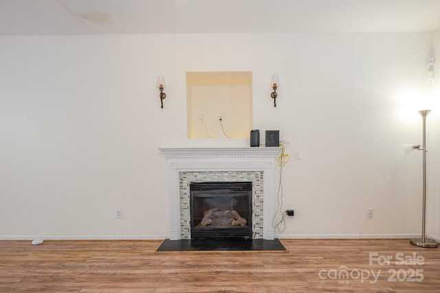 10016 Lawing School Rd, Charlotte, NC 28214 - unfurnished living room featuring wood finished floors and a fireplace