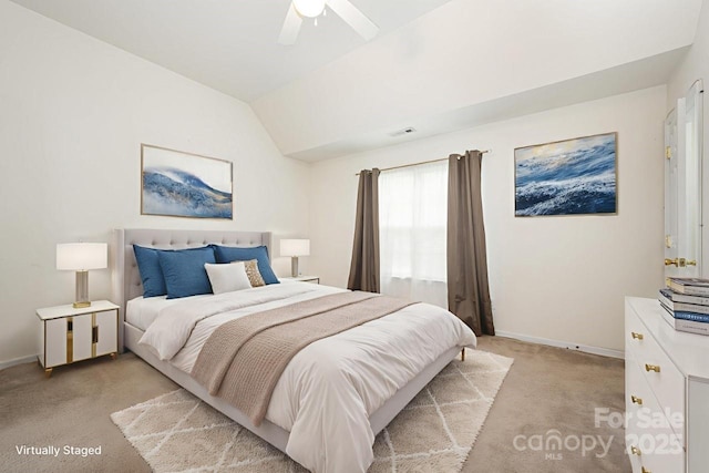 10016 Lawing School Rd, Charlotte, NC 28214 - bedroom with light colored carpet, lofted ceiling, and a ceiling fan