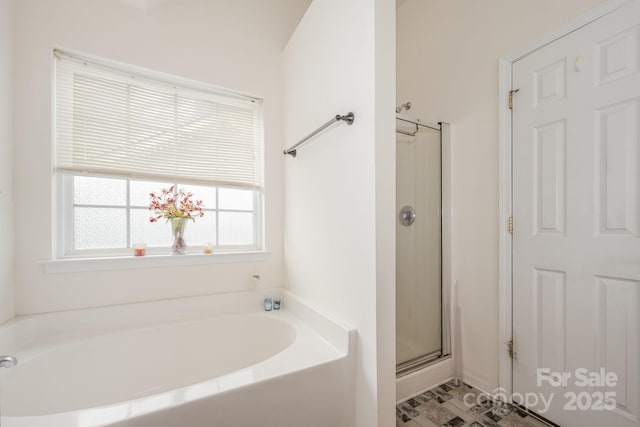 10016 Lawing School Rd, Charlotte, NC 28214 - bathroom featuring a garden tub and a shower stall