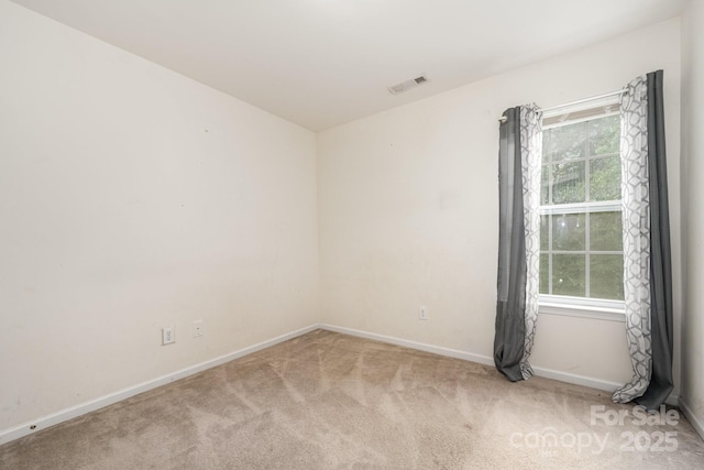 10016 Lawing School Rd, Charlotte, NC 28214 - spare room featuring carpet floors and healthy amount of natural light