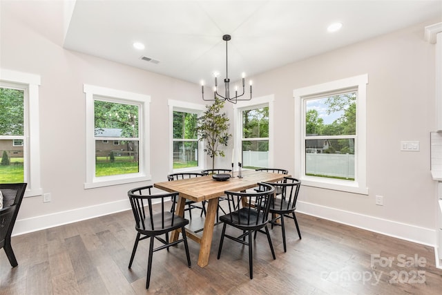 9527 Walkers Ferry Rd, Charlotte, NC 28214 - dining area featuring a chandelier, dark wood finished floors, and recessed lighting