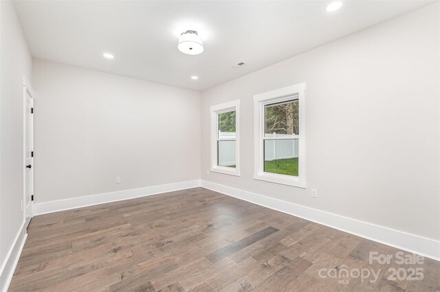 9527 Walkers Ferry Rd, Charlotte, NC 28214 - unfurnished room featuring wood finished floors and recessed lighting