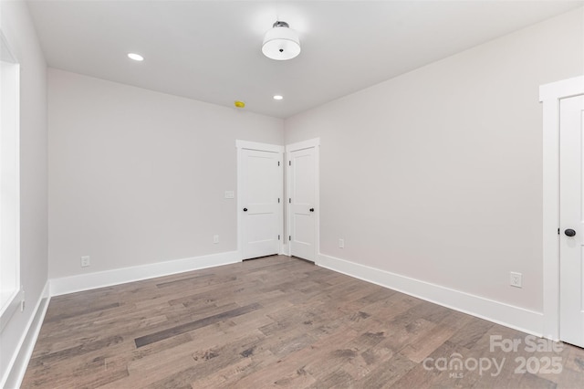 9527 Walkers Ferry Rd, Charlotte, NC 28214 - empty room featuring wood finished floors and recessed lighting