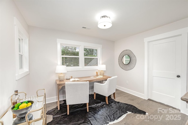 9527 Walkers Ferry Rd, Charlotte, NC 28214 - dining room with wood finished floors and an office area