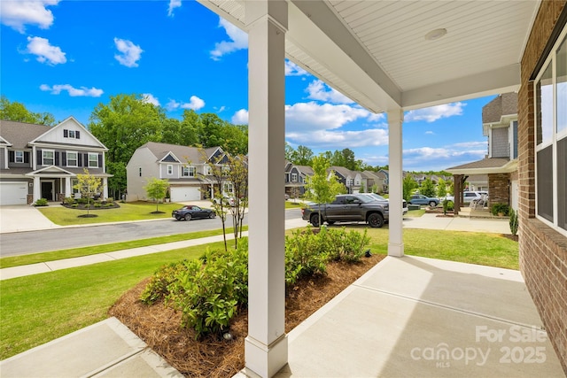 191 Tackle Box Dr, Troutman, NC 28166 - view of patio with a residential view and covered porch