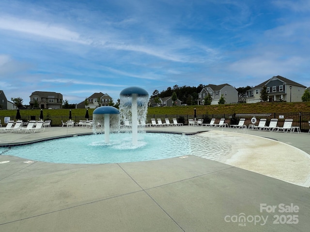 191 Tackle Box Dr, Troutman, NC 28166 - community pool with fence, a patio, and a residential view