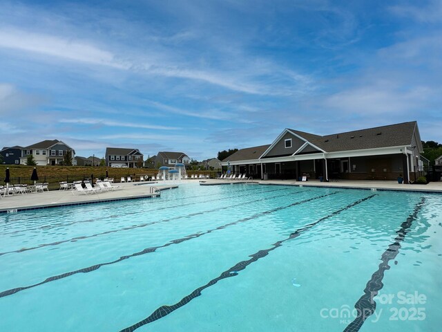 191 Tackle Box Dr, Troutman, NC 28166 - community pool with fence and a patio area