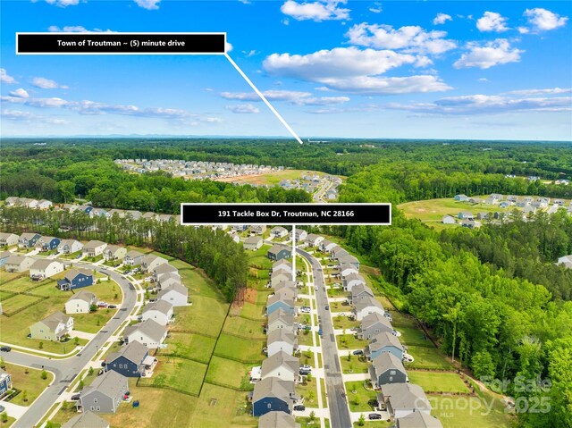 191 Tackle Box Dr, Troutman, NC 28166 - aerial perspective of suburban area featuring a forest