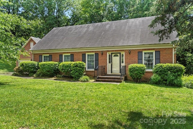 8017 Prince George Rd, Charlotte, NC 28210 - cape cod home with brick siding, a front lawn, and a shingled roof