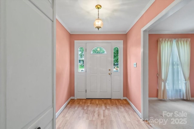 8017 Prince George Rd, Charlotte, NC 28210 - entryway with baseboards, light wood-type flooring, and crown molding